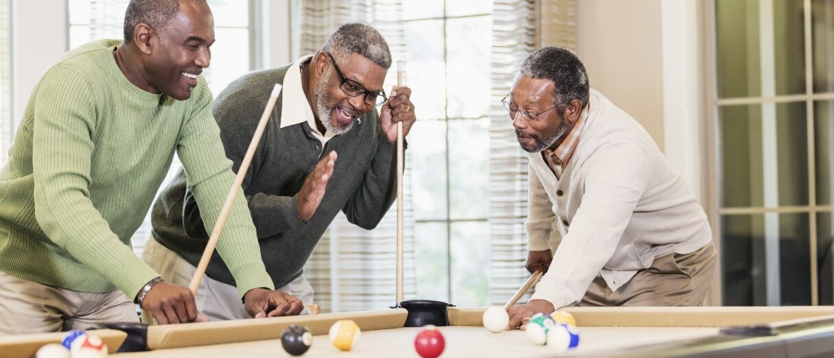 5 older people laughing